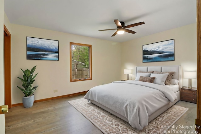 404 Rand Rd, Lakemoor, IL 60050 - bedroom featuring baseboards, light wood-style flooring, and ceiling fan