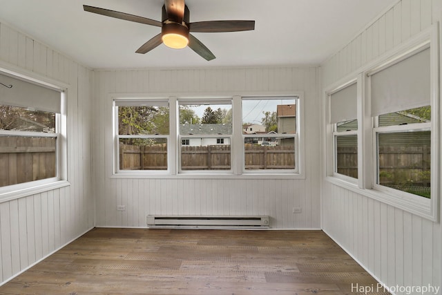404 Rand Rd, Lakemoor, IL 60050 - unfurnished sunroom featuring a baseboard radiator