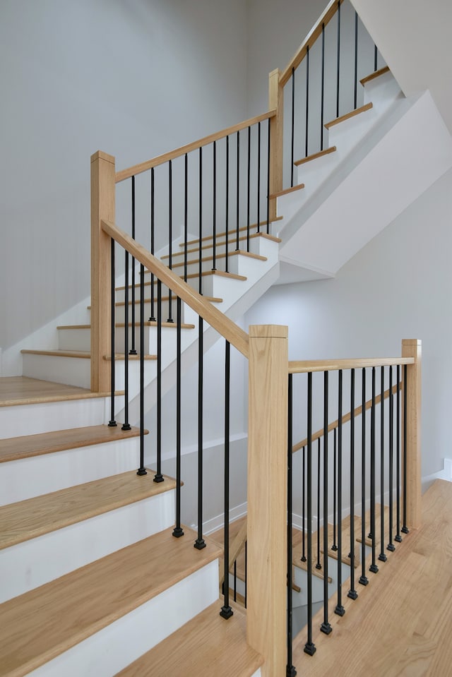 2123 N Austin Ave, Chicago, IL 60639 - stairway featuring baseboards and wood finished floors