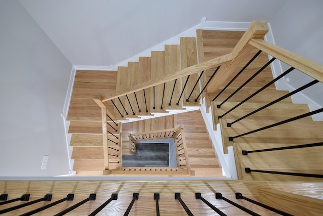 2123 N Austin Ave, Chicago, IL 60639 - staircase featuring baseboards and wood finished floors