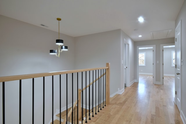 2123 N Austin Ave, Chicago, IL 60639 - hallway featuring visible vents, attic access, light wood-type flooring, recessed lighting, and an upstairs landing