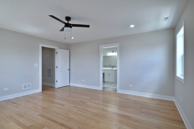2123 N Austin Ave, Chicago, IL 60639 - unfurnished bedroom featuring visible vents and light wood-type flooring