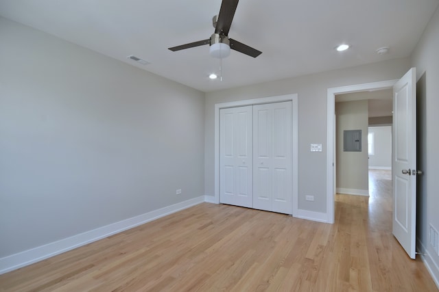 2123 N Austin Ave, Chicago, IL 60639 - unfurnished bedroom featuring recessed lighting, baseboards, a closet, and light wood finished floors