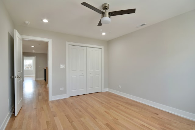 2123 N Austin Ave, Chicago, IL 60639 - unfurnished bedroom featuring visible vents, baseboards, a closet, recessed lighting, and light wood-style flooring
