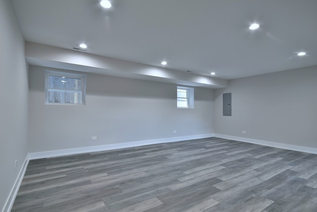 2123 N Austin Ave, Chicago, IL 60639 - basement featuring recessed lighting, baseboards, wood finished floors, visible vents, and electric panel