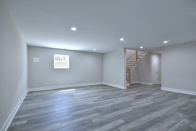 2123 N Austin Ave, Chicago, IL 60639 - below grade area with recessed lighting, baseboards, wood finished floors, and stairway