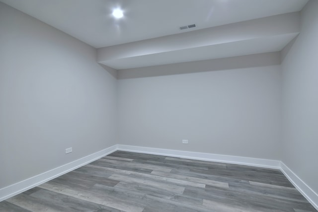 2123 N Austin Ave, Chicago, IL 60639 - spare room with baseboards, visible vents, and dark wood-type flooring