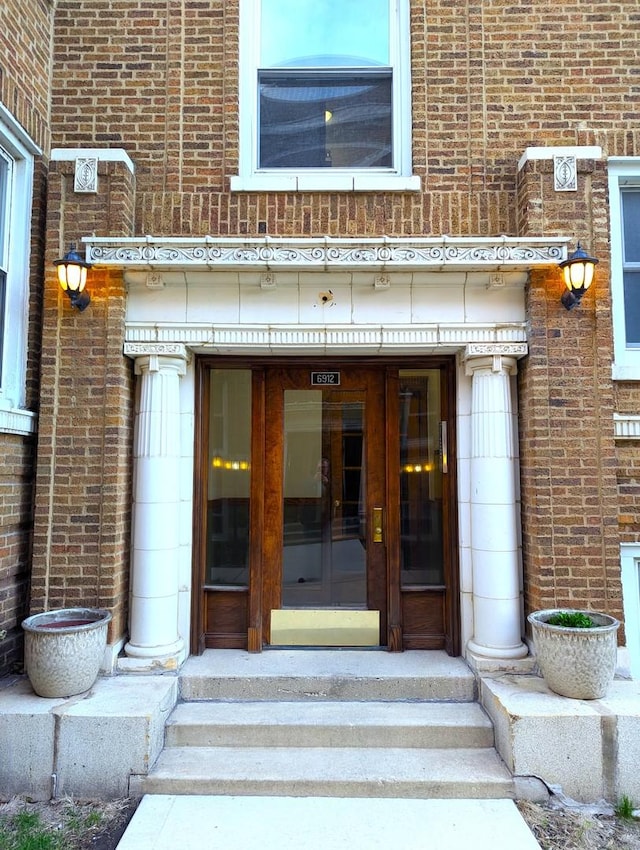 6912 N Lakewood Ave Unit 1W, Chicago, IL 60626 - property entrance with brick siding and french doors