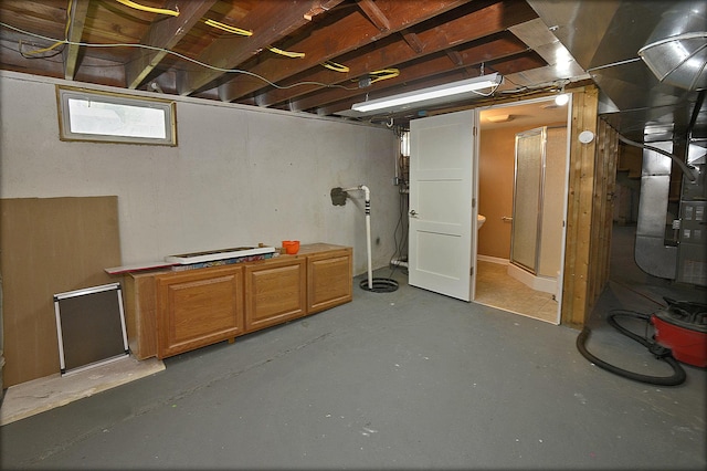 unfinished basement with heating unit
