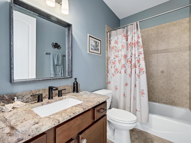 full bathroom with tile patterned flooring, shower / bath combo, toilet, and vanity
