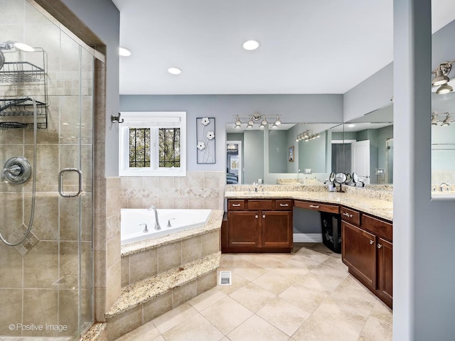 bathroom featuring vanity, recessed lighting, tile patterned floors, a bath, and a shower stall