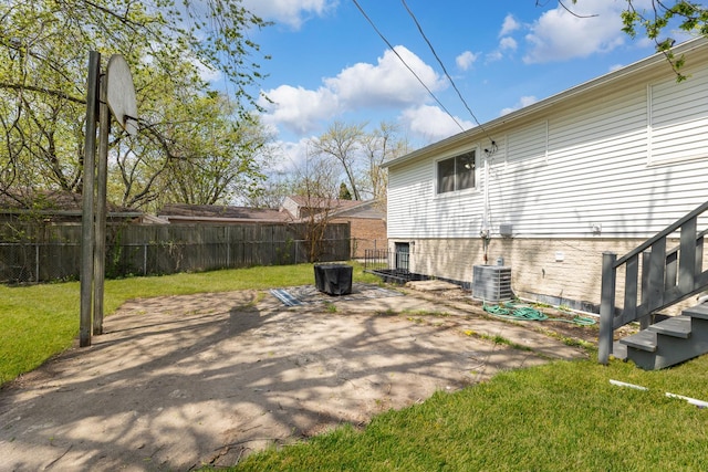view of patio / terrace with fence and central AC