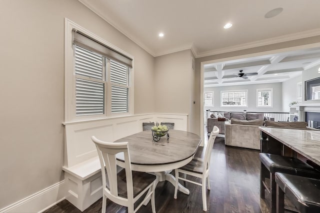 dining area with coffered ceiling, beam ceiling, a ceiling fan, dark wood-style flooring, and crown molding