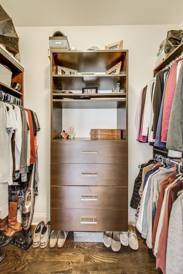 spacious closet with wood finished floors
