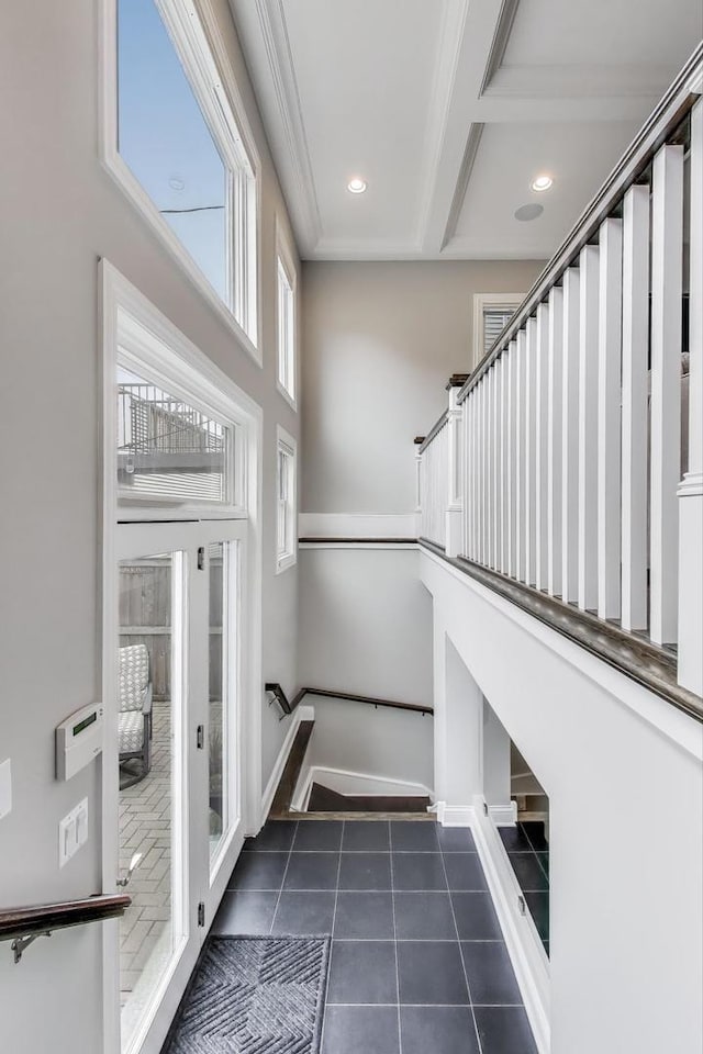 stairway with tile patterned flooring, recessed lighting, and baseboards