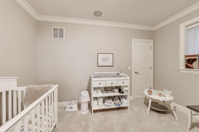 carpeted bedroom featuring a crib, ornamental molding, and baseboards