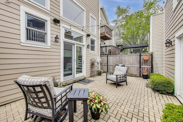 view of patio with fence
