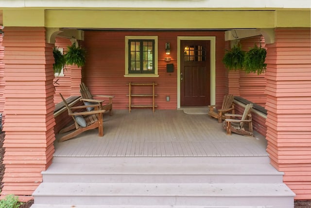 1314 E Washington St, Bloomington, IL 61701 - view of exterior entry featuring a porch