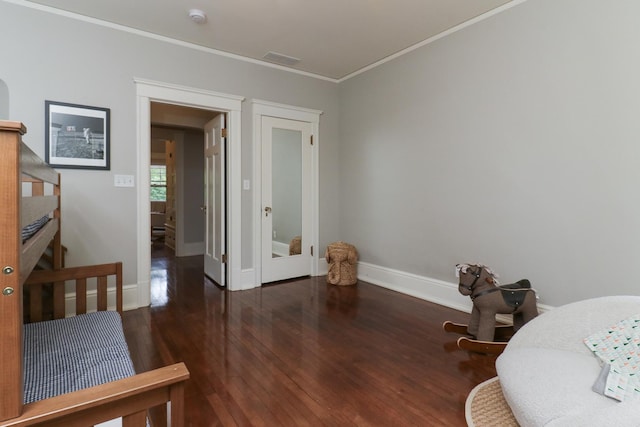 1314 E Washington St, Bloomington, IL 61701 - bedroom with crown molding, baseboards, and wood finished floors
