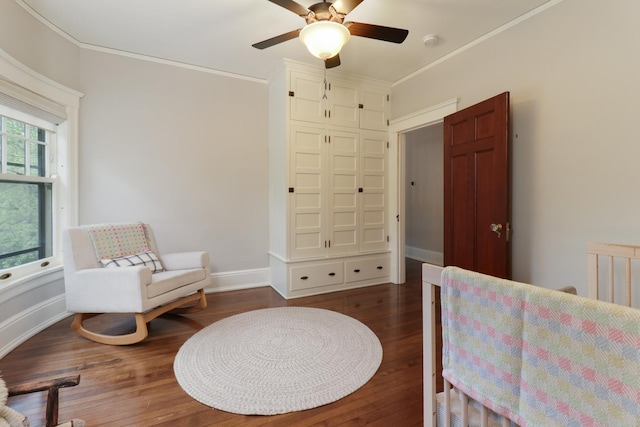 1314 E Washington St, Bloomington, IL 61701 - bedroom featuring crown molding, a ceiling fan, baseboards, and wood finished floors