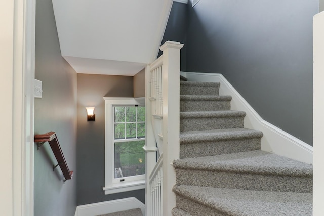 1314 E Washington St, Bloomington, IL 61701 - stairway featuring baseboards