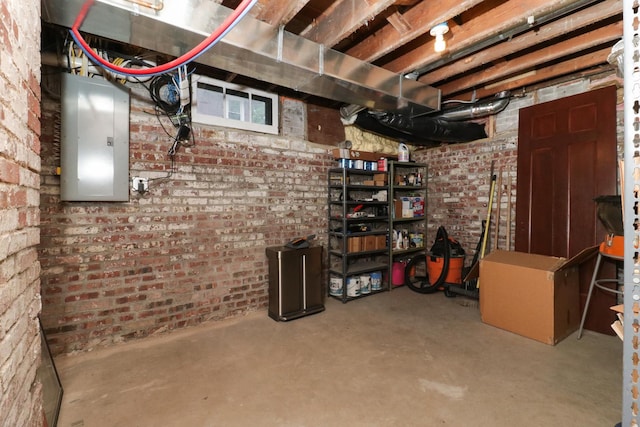 1314 E Washington St, Bloomington, IL 61701 - unfinished basement featuring electric panel and brick wall