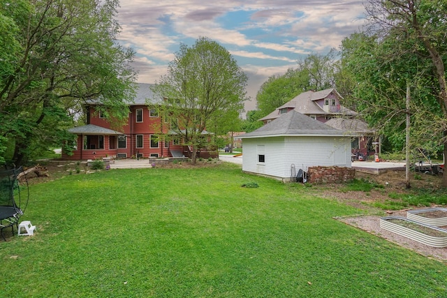 1314 E Washington St, Bloomington, IL 61701 - view of yard featuring a patio