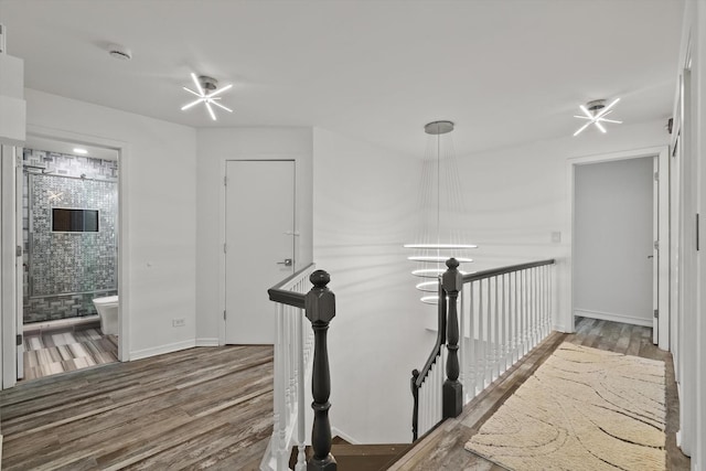 1105 Foxtail Ct Unit 1105, Darien, IL 60561 - corridor with baseboards, an upstairs landing, and wood finished floors