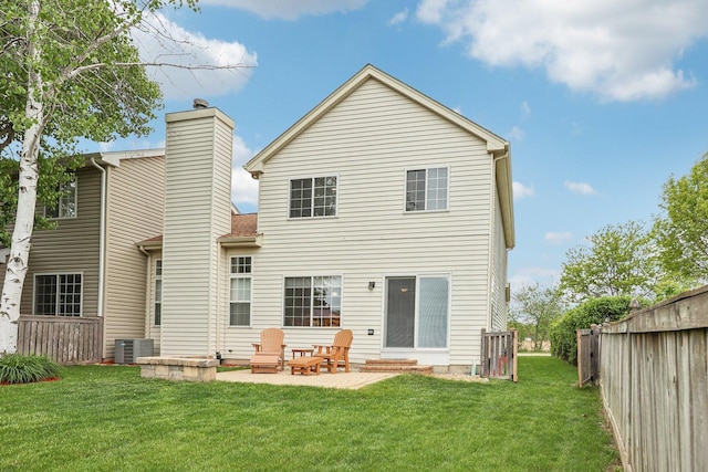 1011 Blackburn Dr, Grayslake, IL 60030 - rear view of property with a patio area, central AC unit, and a chimney