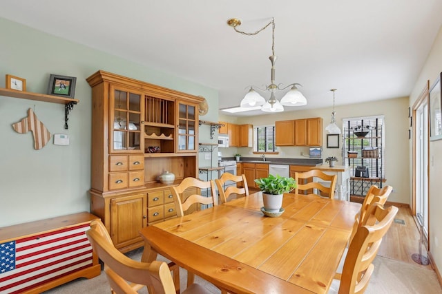 1011 Blackburn Dr, Grayslake, IL 60030 - dining space with a chandelier and healthy amount of natural light