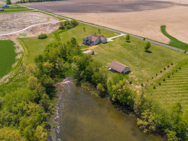 aerial view of property's location featuring rural landscape and a nearby body of water