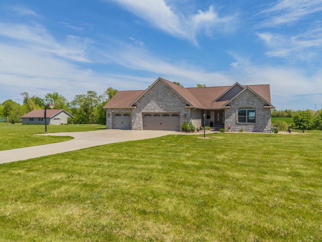 view of front of home with a garage, a front yard, and driveway
