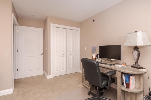 office space featuring carpet and baseboards