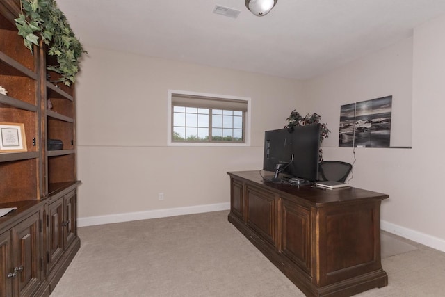 home office with baseboards and carpet