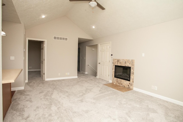 unfurnished living room featuring visible vents, a ceiling fan, baseboards, and carpet flooring