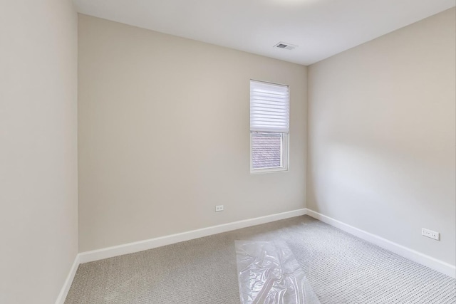 7955 S Paxton Ave, Chicago, IL 60617 - unfurnished room with carpet floors, baseboards, and visible vents