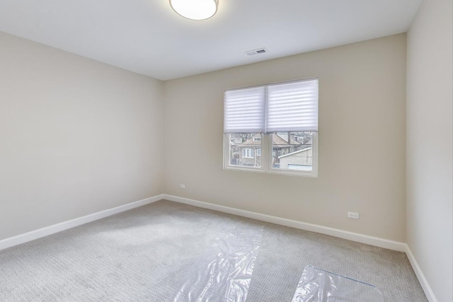 7955 S Paxton Ave, Chicago, IL 60617 - empty room with carpet floors, baseboards, and visible vents