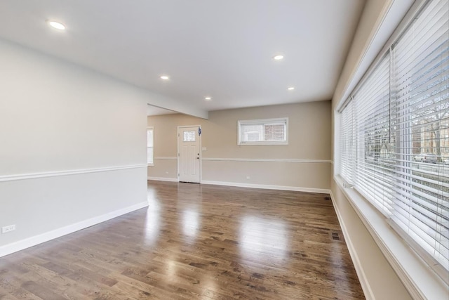 7955 S Paxton Ave, Chicago, IL 60617 - unfurnished room with visible vents, recessed lighting, and wood finished floors