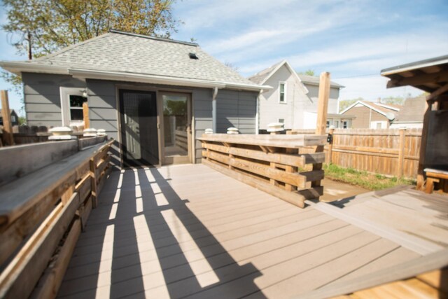 wooden deck featuring fence