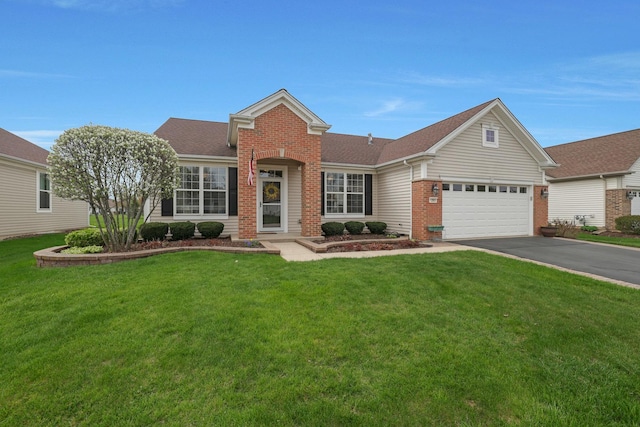12951 Bull Ridge Dr, Huntley, IL 60142 - view of front of property featuring a garage, aphalt driveway, a front yard, roof with shingles, and brick siding