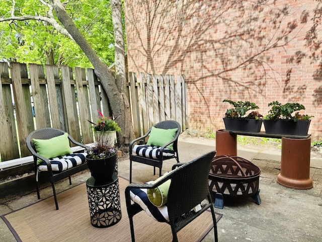 2004 Bruce Dr Unit 1, Urbana, IL 61801 - view of patio with an outdoor living space with a fire pit