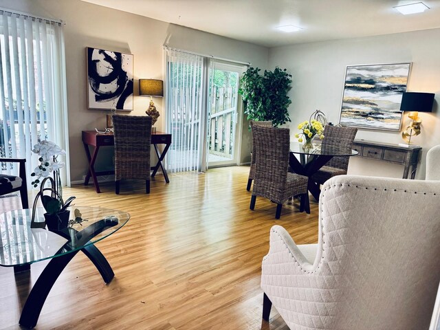 2004 Bruce Dr Unit 1, Urbana, IL 61801 - living room featuring wood finished floors and baseboards