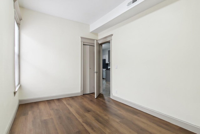 1752 E 72nd Pl, Chicago, IL 60649 - empty room featuring wood finished floors and baseboards