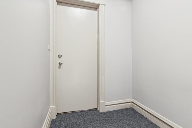 1752 E 72nd Pl, Chicago, IL 60649 - doorway to outside featuring carpet floors and baseboards