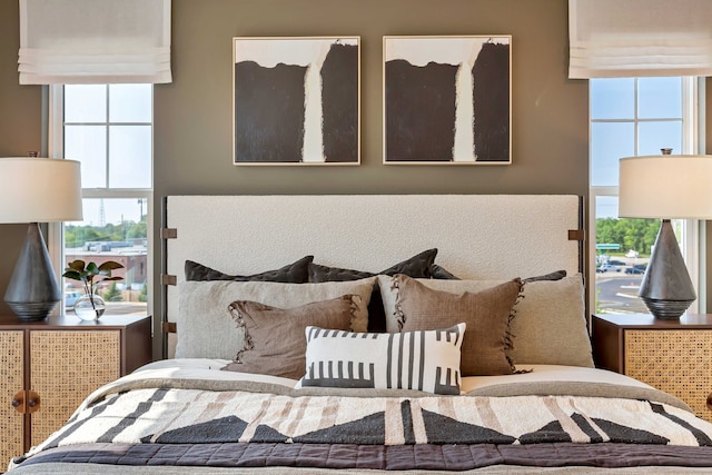 bedroom with multiple windows