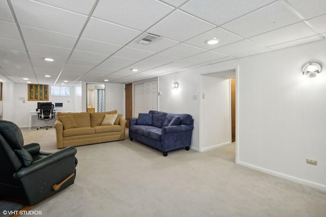 carpeted living area featuring visible vents, recessed lighting, and baseboards