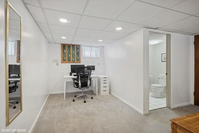 office area with recessed lighting, carpet flooring, and a paneled ceiling