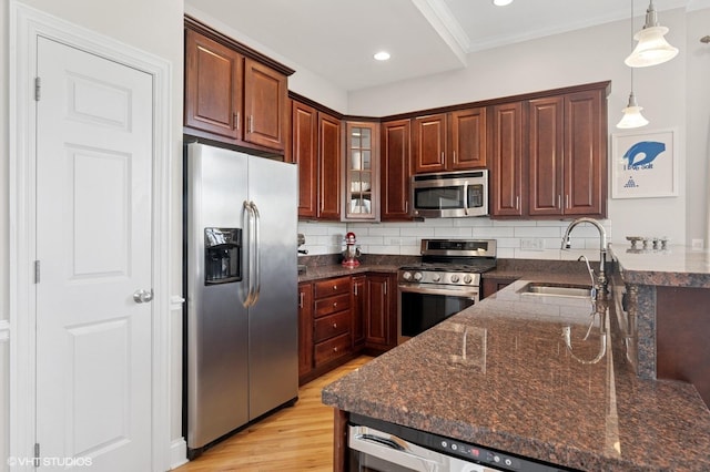 1717 W Newport Ave Unit 5, Chicago, IL 60657 - kitchen with appliances with stainless steel finishes, tasteful backsplash, light wood-style flooring, dark stone counters, and glass insert cabinets