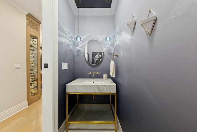 1924 N Wolcott Ave, Chicago, IL 60622 - bathroom featuring wood finished floors, baseboards, and vanity