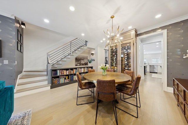 1924 N Wolcott Ave, Chicago, IL 60622 - dining room featuring stairway, light wood-style flooring, a chandelier, recessed lighting, and baseboards
